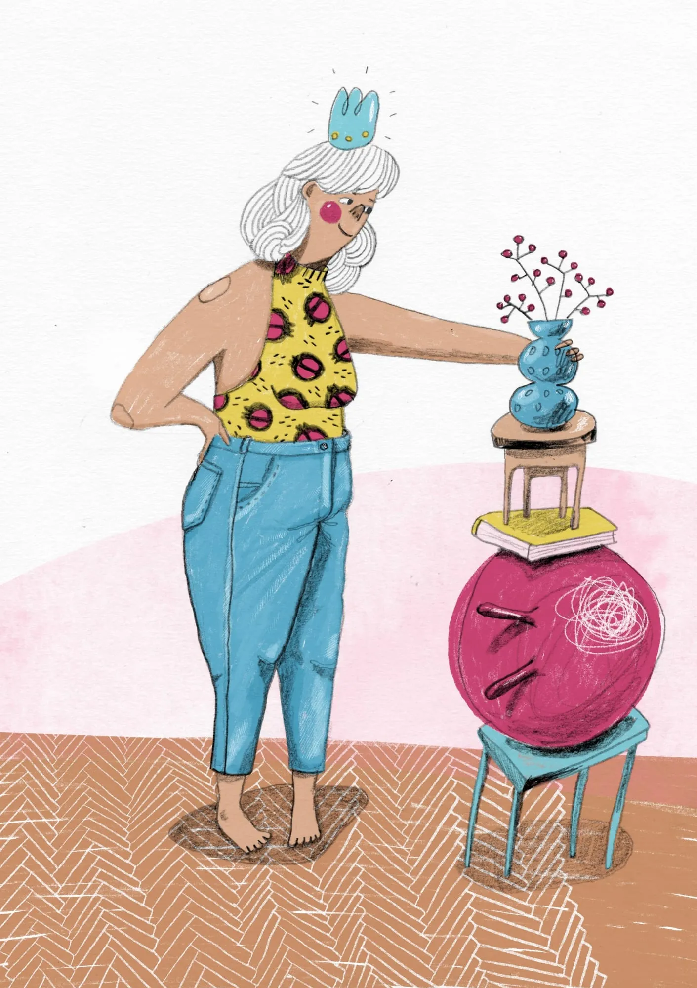 White-haired woman in blue jeans steadies a vase on a stool stacked on books and a pink ball