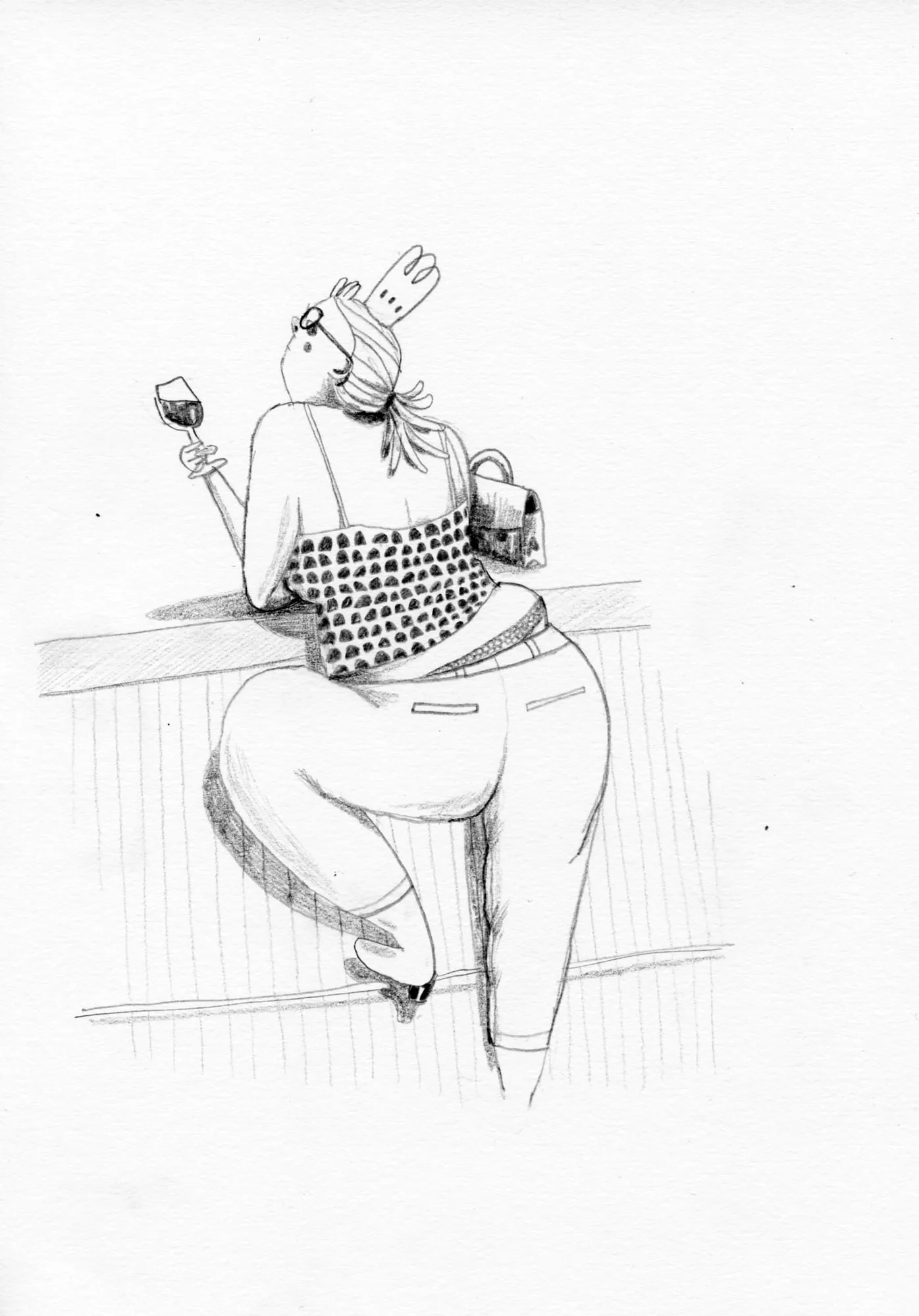 Seen from behind at a bar counter, a woman in cropped trousers raises a glass of red wine