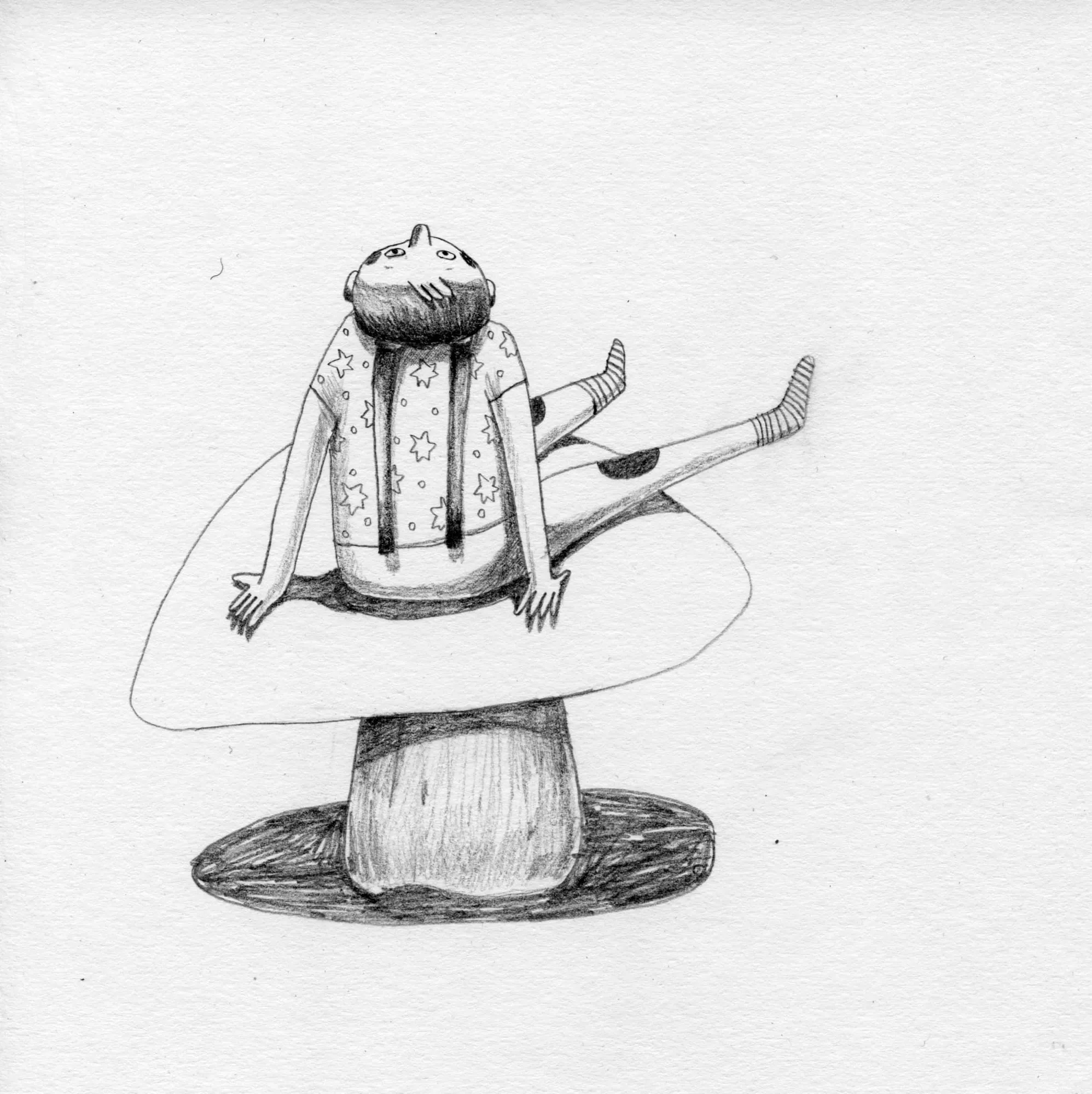 Woman in a star-print top sits cross-legged on the cap of an enormous mushroom